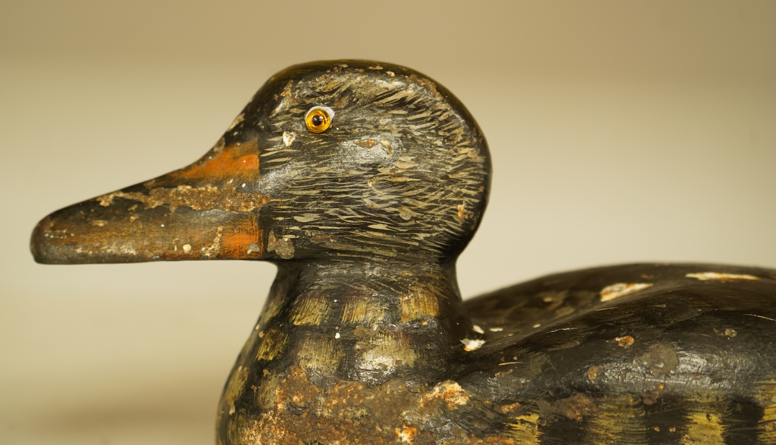 A novelty cast iron doorstop in the form of a duck, 32cm wide
